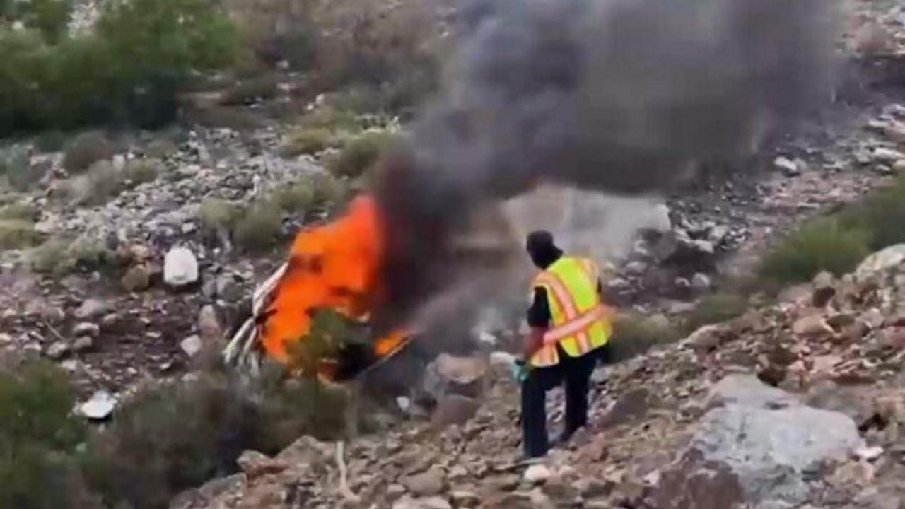 A car burst into flames after rolling over on a busy El Paso road Monday evening